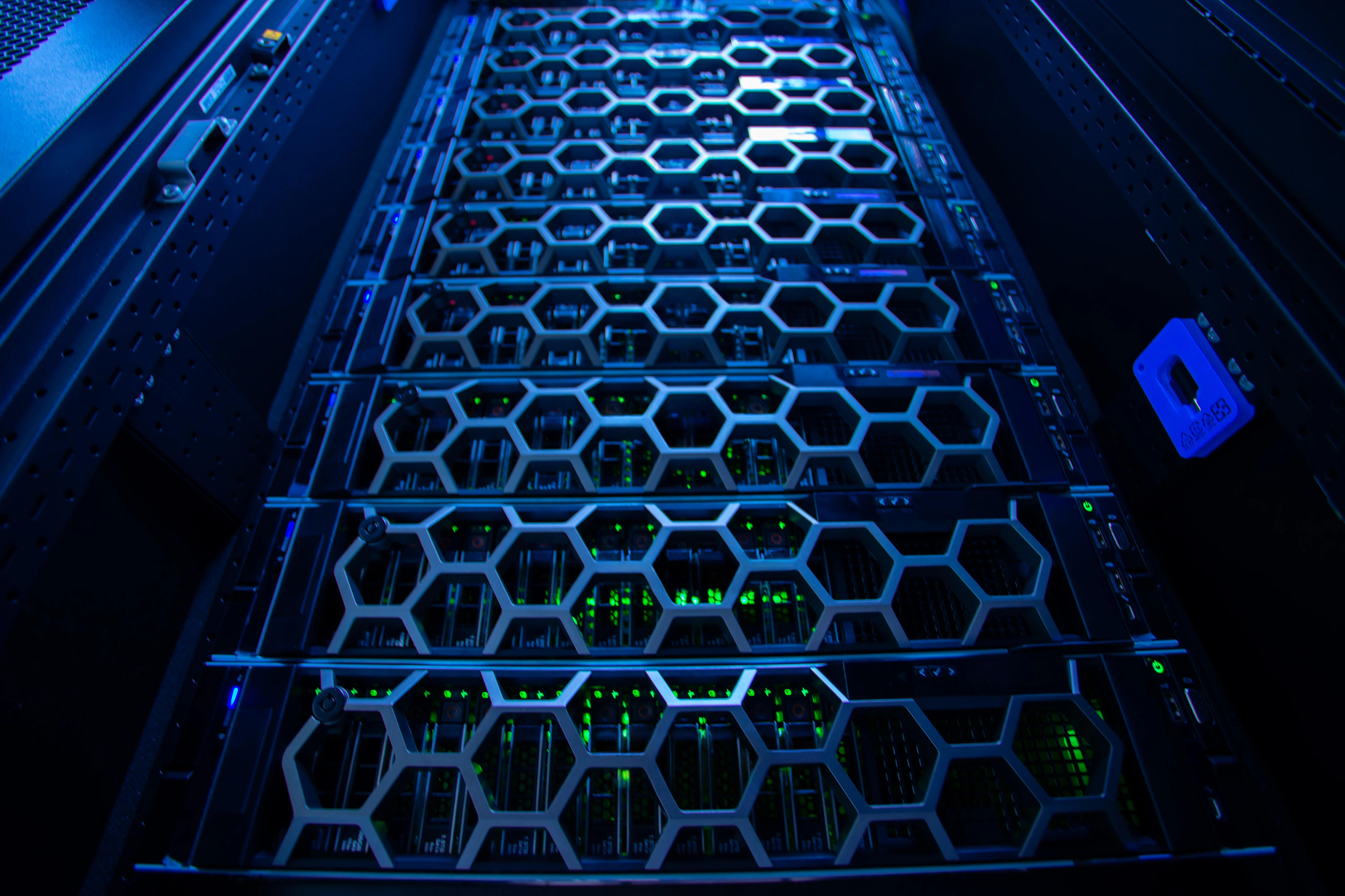Data center with multiple rows of fully operational server racks