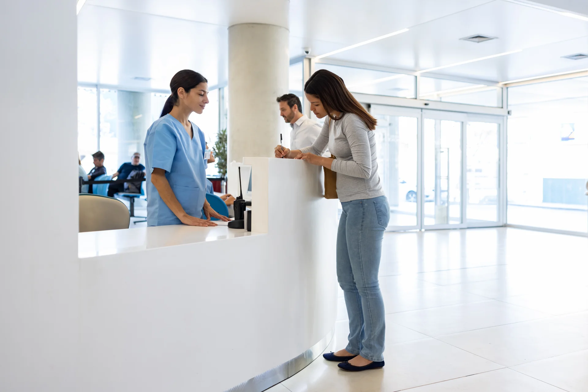 Healthcare staff checking in a patient at a Scottsdale medical practice